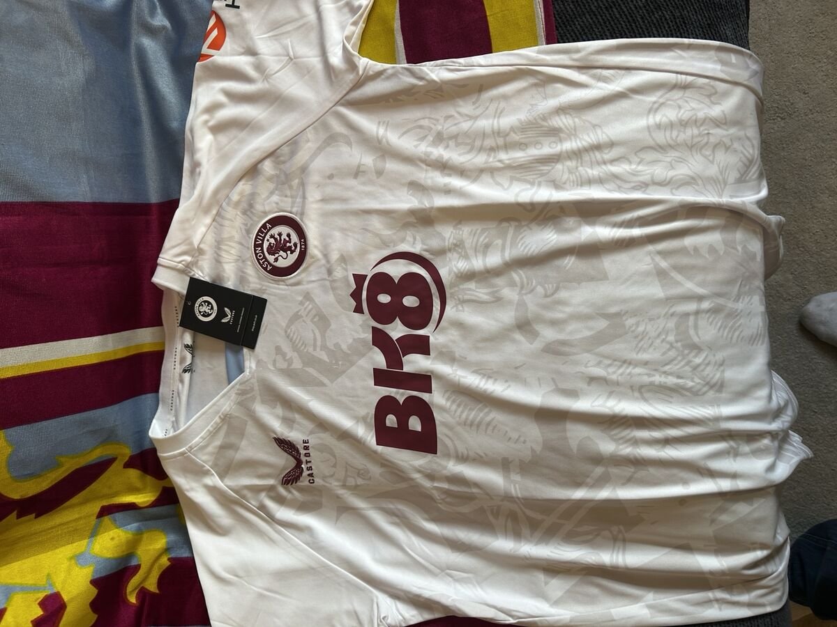 2023/24 Away - white tonal lion pattern